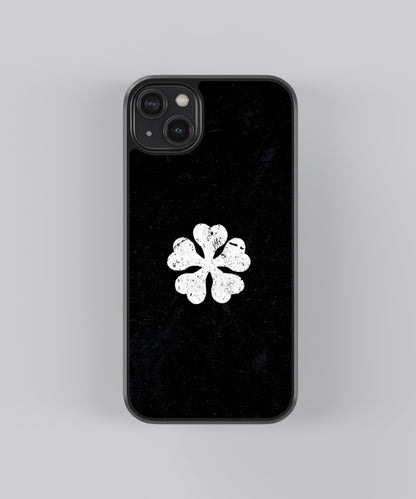 Glossy glass phone case featuring printed design artwork, shown with smooth reflective surface