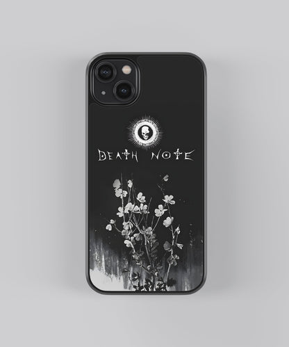 Glossy glass phone case featuring printed design artwork, shown with smooth reflective surface