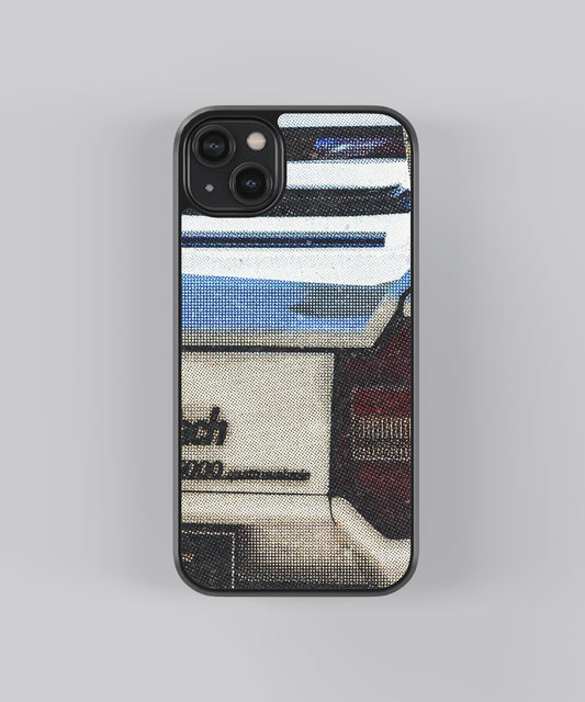Glossy glass phone case featuring printed design artwork, shown with smooth reflective surface
