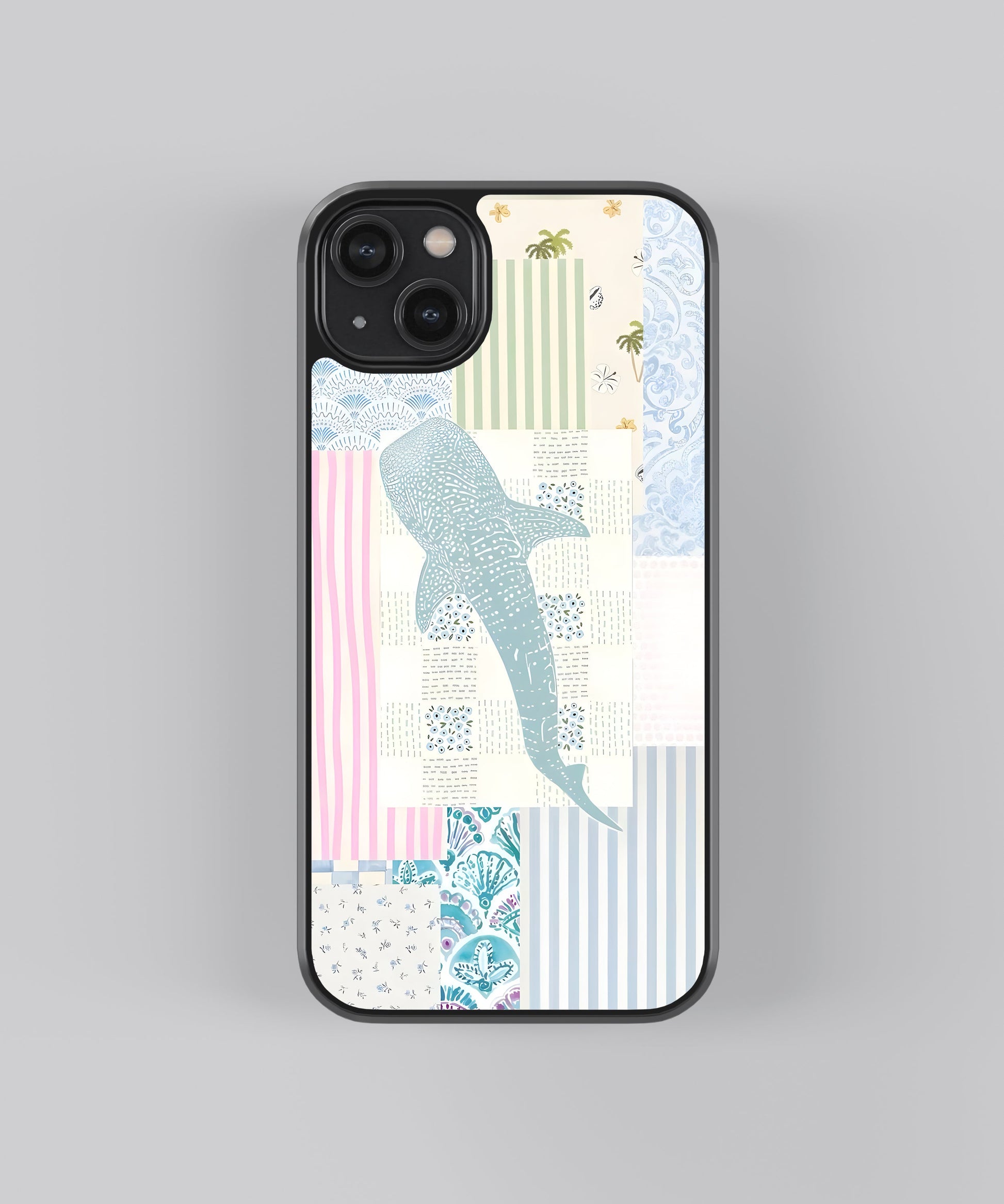 Glossy glass phone case featuring printed design artwork, shown with smooth reflective surface