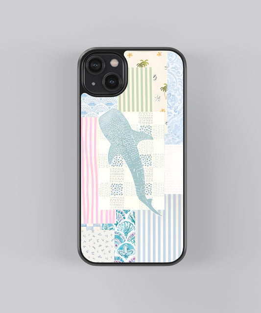 Glossy glass phone case featuring printed design artwork, shown with smooth reflective surface