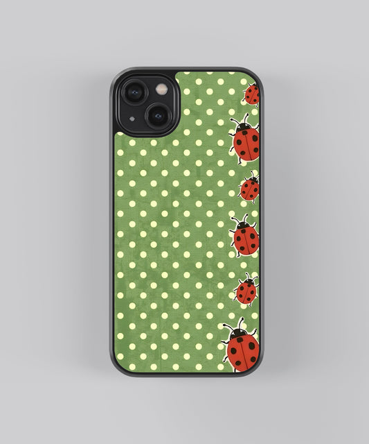 Glossy glass phone case featuring printed design artwork, shown with smooth reflective surface